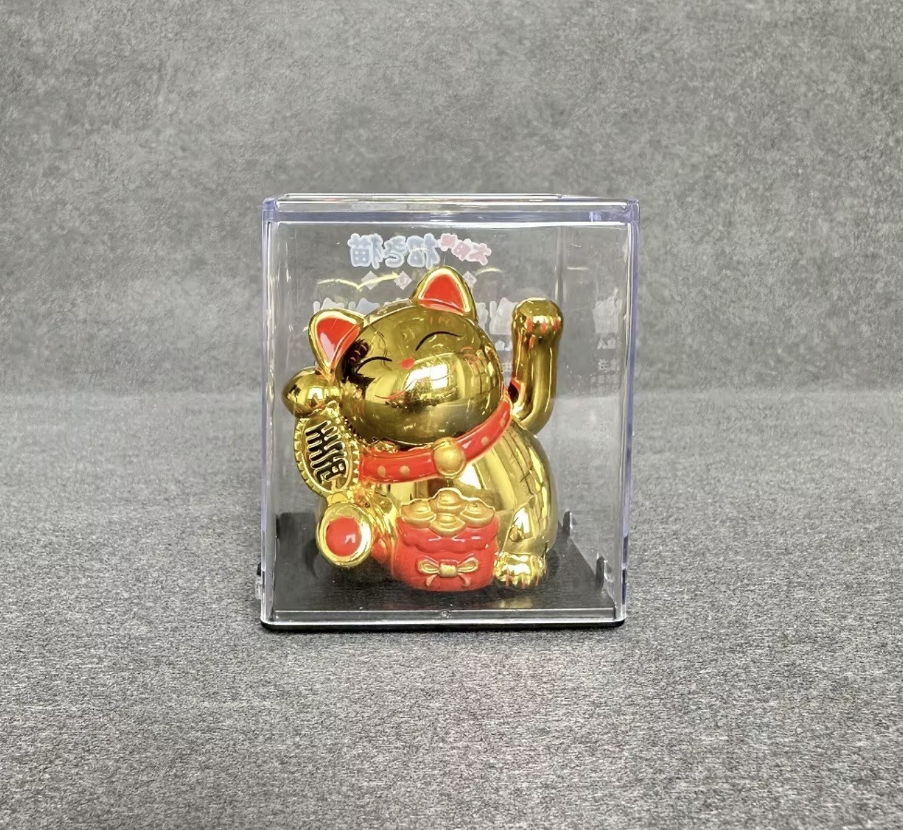 Lucky Cat - Waving Solar Maneki Neko Decoration - Gold with Red Fortune Bag 6.4 x 5.4 x 4.3cm